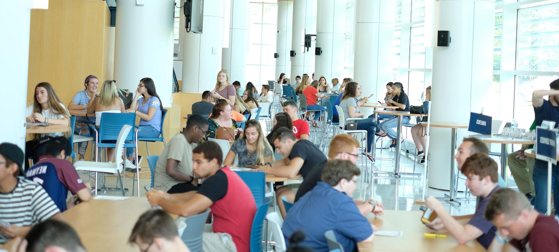 students sitting in the cafeteria